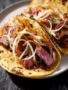 Corned Beef Tacos with Guinness Caramelized Onions First Image